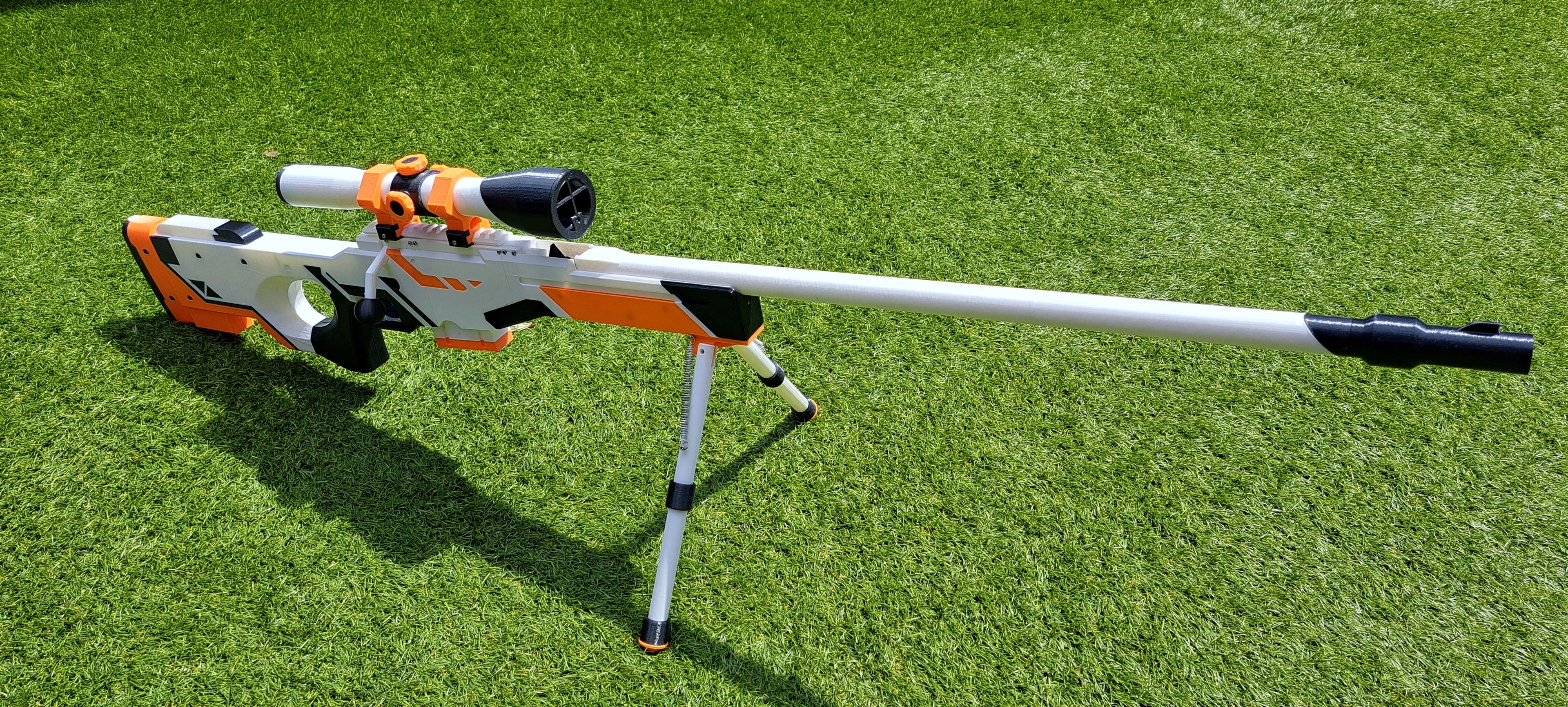 Pusca AWP Asiimov, Counter Strike 2, marime reala, 120 cm, mecanism lansare elastice, distanta pana la 15m, jucarie interactiva & pentru colectionari